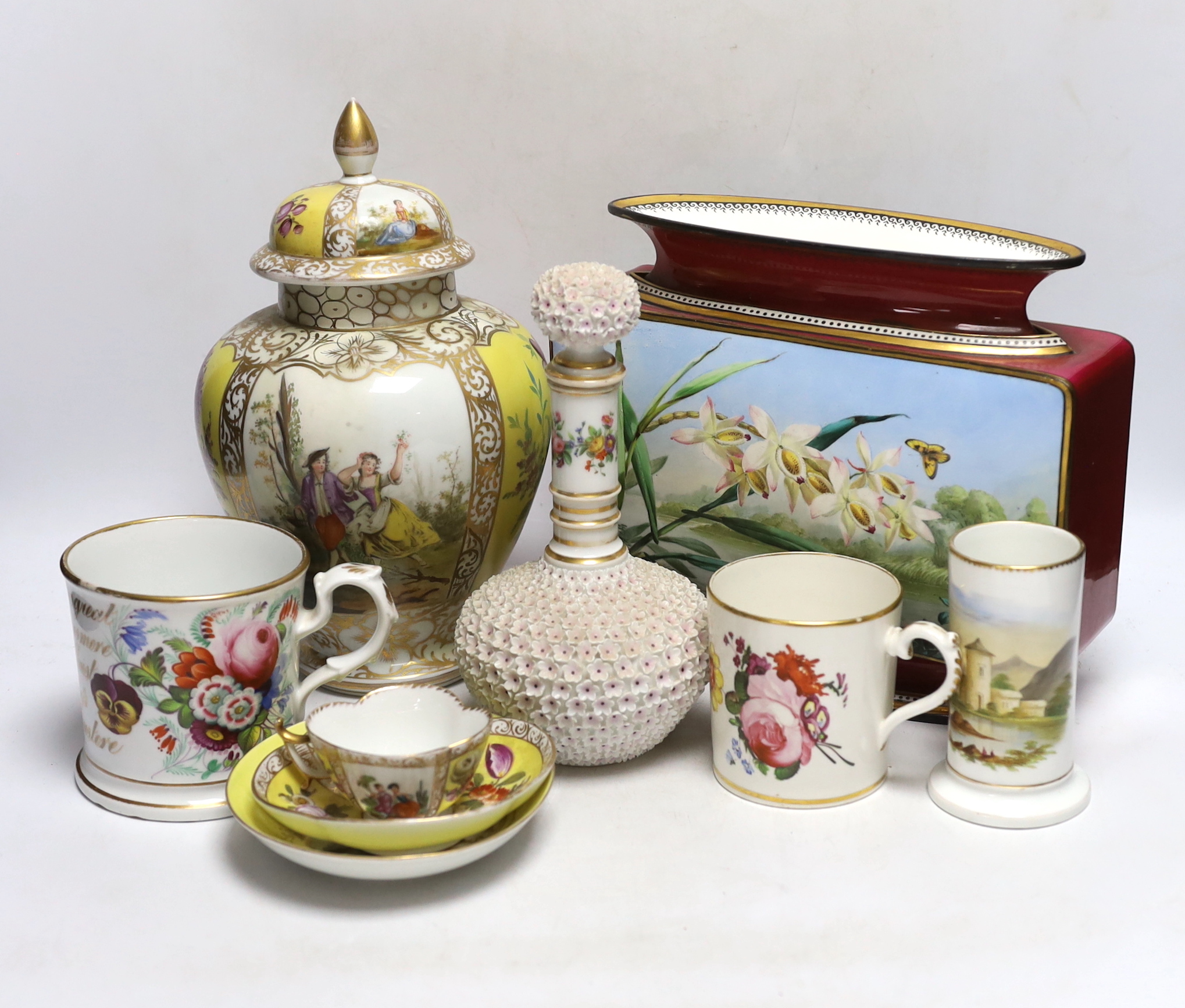 A Dresden jar and cover and similar cup and saucer, a large floral vase, two floral mugs, a floral encrusted bottle and stopper and two other items, largest 28cm high (8)